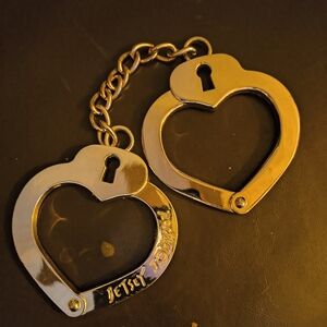 Betsey Johnson Gold Heart Handcuffs.